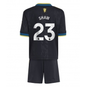 Maillot de football Réplique Manchester United Luke Shaw #23 Troisième Enfant 2025-26 Manche Courte (+ Pantalon court)